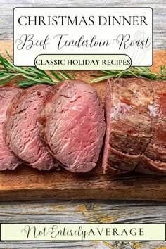 christmas dinner beef tenderie roast on a cutting board with rosemary garnish and text