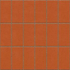 an orange tiled wall with small squares in the middle and one square at the top