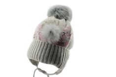 Very cute and simple Winter Pom Pom hat for Girl Made out of the best quality material Hat is Pink in color  Ear Flaps cover the ears in cold weather and straps to tie under the chin Made out of: Top: 40% Visose 25% Polyamid 25% Wool 5% Angorawolle 5% Cashmere Lining: 100% Cotton Natural Pom Pom Winter Cotton Hat For Gifts, Cotton Winter Hat As A Gift, Winter Cotton Hat As Gift, Cotton Winter Hat For Gift, Cotton Winter Hat As Gift, Cream Winter Hat As Gift, Pom Pom Beanie Hat, Pom Beanie, Pom Pom Hat