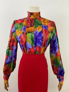 Amazing fabric and colors!! It's conservative! Soft plated panel in the front. Buttons in the back. Perfect condition. 32" to 36" bust  14" shoulder to shoulder  20" pit arm (puffy Sleeves) Kansas City Mo, Shirt Styles, Puffy Sleeves, Womens Clothing Tops, Shirt Style, Art Collection, Multi Color, Chiffon, Bathing Beauties