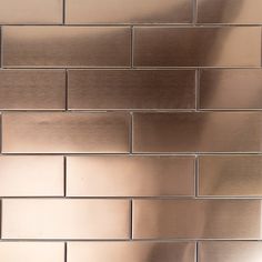 a close up view of a metal tile wall