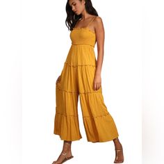 Women’s Jumpsuit Lulus Style Name: Get The Vibe Smocked Wide Leg Jumpsuit Color: Mustard Yellow Size Xs Woven And Adorned With Textured Dots And Shiny Silver Threads Stretchy Smocked Bodice Adjustable Spaghetti Straps Ruffled Tiers Throughout Wide Flowy Pant Legs Lined New With Tags Sold Out Style Yellow Fitted Jumpsuits And Rompers With Ruffles, Fitted Yellow Ruffle Jumpsuits And Rompers, Yellow Ruffled Jumpsuits And Rompers For Summer, Yellow Summer Jumpsuits And Rompers For Vacation, Fitted Yellow Jumpsuits And Rompers For Brunch, Mustard Jumpsuits And Rompers For Summer, Yellow Jumpsuits And Rompers For Day Out, Jumpsuit Lulus, Silver Jumpsuits