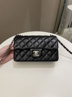 Chanel Classic Quilted Mini RectangularBlack Lambskin SHWSize 20 x 12.5 x 6.5 cmChain drop 53 cmSeries 309/10 Great (faint corner edges rub, underflap and base scratches otherwise great. Almost clean front, back and interior)Includes dust bag and ity card (partial hologram intact)RTP 7060 sgdPrice now 5400 sgd 4050 usd CN5547-01 Mini Chanel, Chanel Mini Bag, Chanel Mini Rectangular, Designer Bags Louis Vuitton, Baggage Claim, Chanel Mini, Luxury Bag, Coach Bag, Carry All Bag