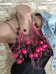 Bohemian Fringe Necklace, Festival Pink Beaded Necklace, Pink Handmade Beaded Necklaces, Bohemian Wooden Beads Jewelry For Party, Handmade Bohemian Bib Necklaces For The Beach, Bohemian Pink Beaded Necklaces, Handmade Bohemian Bib Necklace For Beach, Pink Necklaces With Large Beads For Festivals, Pink Necklace With Large Beads For Festivals