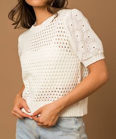 Bring some fun and flair to your wardrobe with this playful Short Sleeve Open Knit & Eyelet Mix Top in white. The round neck, short sleeves, and ribbed details offer a comfortable and stylish fit, while the unique mix of open knit and eyelet textures add a touch of quirkiness. Round neck Short sleeve Open knit & eyelet mix Unlined ribbed hem, neck and cuffs Relaxed fit 60% Cotton, 40% Acrylic Contrast is 100% Cotton Care instructions: Hand wash cold Open Knit, Short Tops, Short Sleeves Tops, Final Sale, Care Instructions, Round Neck, Short Sleeves, Hand Wash, Relaxed Fit