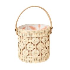 a wicker basket with handles on an isolated white background for use as a decoration