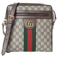 This shoulder bag is constructed of Gucci GG supreme monogram on coated canvas, with brown leather trim and an adjustable shoulder strap. The bag features a front zipper pocket embellished with an aged gold interlocking GG logo, and red and green canvas web stripe detail. The top zip opens to an ivory fabric interior with zip and patch pockets. Color: Beige/ebony Material: Supreme coated canvas Model No.: 547926 Measures: H 9.25” x L 9” x D 2” Drop: 20” Comes with: Dust bag Condition: Excellent. Item is pristine. Made in Italy Designer Shoulder Bag In Signature Coated Canvas, Designer Crossbody Bag In Signature Coated Canvas, Designer Signature Coated Canvas Crossbody Bag, Gucci Coated Canvas Bag With Logo, Designer Brown Shoulder Bag In Signature Coated Canvas, Monogram Canvas Satchel Shoulder Bag With Logo, Gucci Business Bag With Logo, Designer Shoulder Bag In Signature Coated Canvas For Travel, Gucci Brown Coated Canvas Shoulder Bag