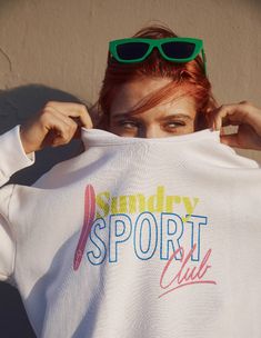 Sundry Sport Club Sweatshirt in Cream Vintage Sport Sweatshirt, Athleisure Logo Print Sweatshirt For Spring, Spring Athleisure Sweatshirt With Logo Print, Sporty Sweats With Graphic Print And Relaxed Fit, Sporty Crew Sweatshirt For Spring, Sporty Crew Neck Sweatshirt For Spring, Spring Sporty Crew Sweatshirt, Sporty Graphic Print Crew Sweats, Trendy Sports Sweats With Letter Print