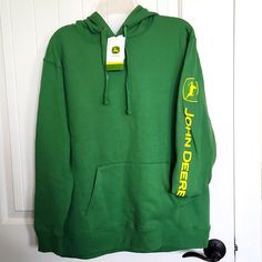 New With Tags John Deer Hoodie Pullover Sweatshirt Graphics Down Sleeve Heavy Duty Hood With Draw Strings Kangaroo Pockets P2p- 23" Length- 28' Green Tops With Kangaroo Pocket For Spring, Green Fleece Top With Drawstring Hood, Green Fleece Hooded Sweater, Yellow Spring Hoodie Outerwear, Green Crew Neck Sweatshirt With Kangaroo Pocket, Green Crew Neck Sweater With Drawstring Hood, Green Sweatshirt With Kangaroo Pocket For Spring, Green Fleece Hoodie Sweater, Casual Yellow Hoodie With Ribbed Cuffs