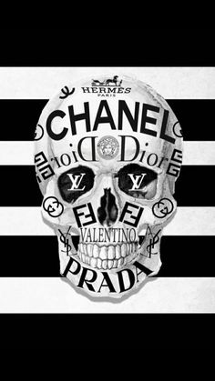 a black and white image of a skull with the words chanel written on it