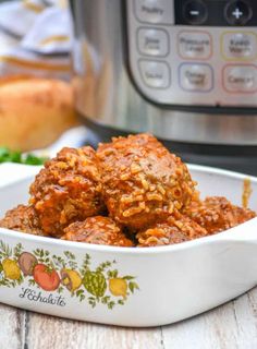 meatballs in a white bowl next to an instant pressure cooker