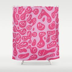 a pink shower curtain with an animal print