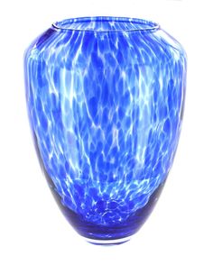 a blue glass vase with water in it