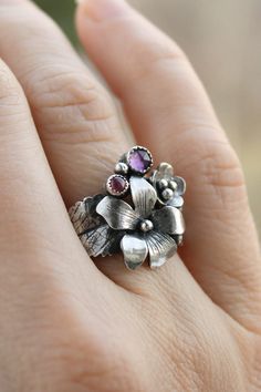 ITEM DESCRIPTION: I can make it any size you want - just mark your size in the order Weight - 4 g I made this viola flower ring from 925 silver, amethyst, and pink sapphire. But you can order it with different stones. This ring is amazing! The tiny flowers and leaves look romantic and delicate on your fingers. This is a real treasure for an elven princess. More viola jewelry in my shop https://www.etsy.com/shop/UrsulaJewelry?ref=seller-platform-mcnav&search_query=viola Unique 3d Flower Jewelry, Unique 3d Flower Shaped Jewelry, Elegant Sterling Silver Flower Ring With Birth Flower, Flower Shaped Sterling Silver Ring With Gemstone, Sterling Silver Flower Shaped Gemstone Ring, Botanical Flower Wedding Jewelry, Delicate Flower-shaped Gemstone Rings, Delicate Flower Shaped Gemstone Ring, Sterling Silver Flower Ring For Wedding