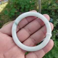 Bangle Measures 67.3 Mm From The Outside In Diameter, Measures 52.5 Mm From The Inside, Measures 7.5 Mm Thick, And Measures 7mm Wide, In Some Parts. And 26.50 Grams. W/Natural Inclusions, It's Unique And Delicate. Will Make A Special Gift. Please Make Sure It's The Right Size. Handmade White Jade Bracelets, Handmade White Bracelets For Formal Occasions, Classic White Bangle Bracelet, Classic White Handmade Bracelets, White Bangle For Gift, Classic White Bangle Jewelry, Jade Bangle Bracelet, Asian Jewelry, Jade Bangle