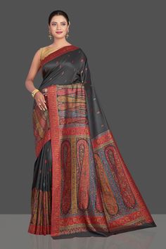 Shop stunning black tussar silk sari online in USA with multicolor Kani embroidery. Make your presence felt on special occasions in beautiful embroidered sarees, handwoven sarees, pure silk saris, tussar sarees from Pure Elegance Indian saree store in USA.-full view Traditional Black Pashmina Shawl For Festive Occasions, Multicolor Pashmina Saree Traditional Wear, Black Tussar Silk Saree With Self Design, Black Traditional Wear With Kalamkari Print In Chanderi, Black Chanderi Traditional Wear With Kalamkari Print, Multicolor Pashmina Saree, Multicolor Pashmina Saree For Diwali, Traditional Multicolor Pashmina Saree, Multicolor Pashmina Saree In Traditional Drape