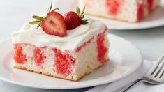 a piece of strawberry cake on a plate with a fork