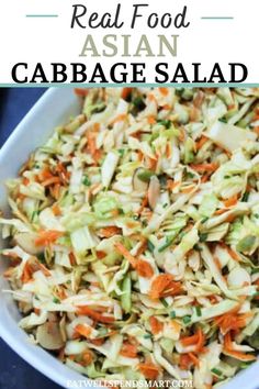 cabbage salad in a white bowl with carrots and celery