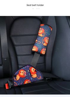 the seat belt holder is designed to look like it has lions and other animals on it