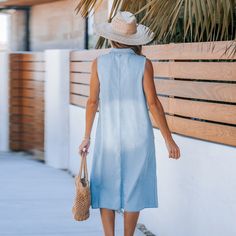 Looking for a relaxed yet stylish look? The Faded Denim Collared Sleeveless Midi Dress combines a classic collared design with a breezy sleeveless cut. Its midi length and faded denim give it a laid-back vibe perfect for easygoing days. Product code: CAA05A4H132SS Chic Sleeveless Denim Vest For Spring, Spring Washed Sleeveless Denim Dress, Sleeveless Washed Blue Denim Dress For Spring, Summer Light Wash Denim Vest With Relaxed Fit, Summer Denim Vest With Relaxed Fit, Summer Light Wash Denim Vest, Relaxed Fit, Light Wash Denim Vest With Relaxed Fit For Summer, Summer Relaxed Fit Denim Vest, Summer Denim Vest For Day Out