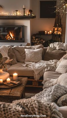 a living room filled with lots of furniture and candles on top of each other in front of a fire place