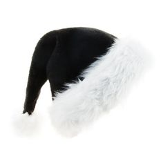 a black and white hat with fluffy fur on the side, sitting up against a white background