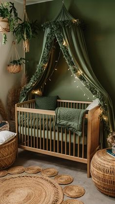 a baby's room decorated in green and gold with wicker crib, round rugs, potted plants and hanging lights