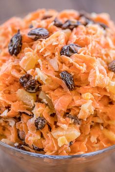 carrot salad with raisins in a glass bowl