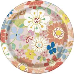 a pink plate with colorful flowers on it