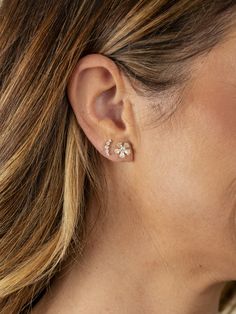 Add a touch of chic sparkle with our Kelly Climber Stud Earrings. These graduated diamond studs are designed in a graceful curved shape, making them perfect for second or third piercings. Crafted to enhance your everyday style, these earrings offer a playful yet elegant look that’s both versatile and irresistibly cute. Second Stud Earrings, Tennis Jewelry, Flower Earrings Studs, Flower Studs, Stunning Earrings, Religious Jewelry, Baguette Diamond, Elegant Earrings, Gold Filled Jewelry