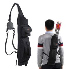 a man holding an archery set in his back pocket