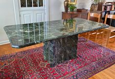 This Large 1970s Italian Green Verde Marble Stone Rectangular Pedestal Dining Table is a statement of timeless elegance. Crafted with meticulous attention to detail, the table boasts a stunning marble stone top.  Designed to be versatile, this rectangular table can effortlessly transition from a sophisticated dining table to an executive conference table, offering an impressive focal point in both settings.  VINTAGE ITEMS Our selection of vintage items exhibits subtle signs of wear, consistent w Green Marble Dining Room Table, Green Marble Table Dining, Dining Room Marble Table, Green Marble Dining Table, Marble Table Dining, Green Granite Kitchen, Green Dining Table, Green Marble Coffee Table, Granite Kitchen Table