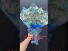 a hand holding a bunch of money in front of a black door with the words party for dollars and wrapping paper on it