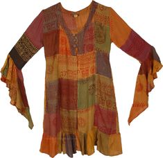 A boho chic hippie rayon patchwork tunic dress with Indian motifs.  The duster has long drapey sleeves, a v-neck with three button enclosure, and a patchwork style with a frilled bottom. #tlb #Patchwork #Fall #Printed #bohemianfashion #Halloween #Indian #Duster #patchworkdress Hippie Style Multicolor Long Sleeve Boho Dress, Multicolor Long Sleeve Hippie Boho Dress, Multicolor Long Sleeve Boho Hippie Dress, Multicolor Long Sleeve Boho Dress For Festivals, Eclectic Townhouse, Bohemian Halloween, Halloween Indian, Hippie Garden, Indian Motifs