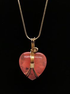 "Cherry Quartz Heart Shaped Crystal Necklace. Beautiful unique sweet red glossy stone. Lovingly wrapped in your choice of high-quality tarnish resistant gold colored brass or silver.  Set with matching color of your choice of 18' or 20\" plated snake chain necklace.  Crystal Properties: Cherry-Quartz is a powerful energy and healing stone for your spirit. It will bring about a heightened spiritual awareness. It's also an excellent stone for concentration. This makes it a must-have stone for inte Quartz Crystal Jewelry, Heart Chakra Healing, Wire Wrapped Jewelry Tutorials, Cherry Quartz, Rose Quartz Jewelry, Wire Jewelry Designs, Snake Chain Necklace, Heart Crystal, Crystal Necklaces