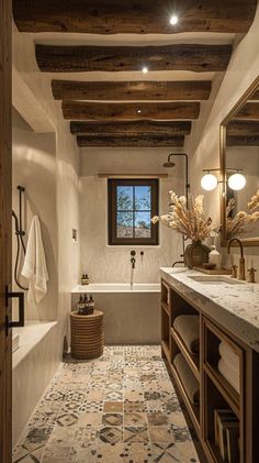 a bathroom with a sink, bathtub and large mirror in it's center