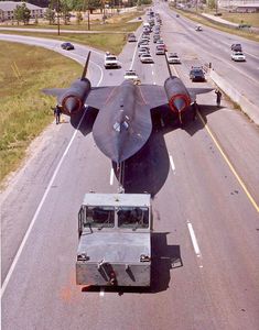 I wouldn't mind being stuck in traffic with the Blackbird. SR-71A (#61-7958) towed down on its way to the Museum of Aviation near Warner Robins GA. (1990) [17652250] Skunk Works, Aviation Humor