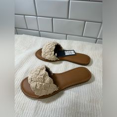 Brand: Universal Thread Color: Tan Size: 6 Never Used New With Tags Beige Synthetic Summer Flip Flops, Casual Flat Sandals With Woven Sole, Adjustable Casual Flip Flops With Flat Heel, Trendy Beige Synthetic Sandals, Trendy Beige Flip Flops For Vacation, Beige Adjustable Casual Flip Flops, Casual Adjustable Beige Flip Flops, Casual Beige Flip Flops, Trendy Beige Synthetic Flip Flops