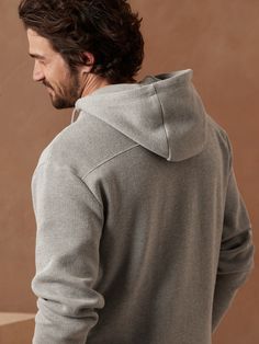 At once luxuriously soft and durable, this double-knit french ribbed hoodie is the perfect addition to your fall wardrobe with drawstring details for adjustable coziness.  Relaxed fit.  Hood.  Straight hem.  Relaxed fit.  Long sleeve.  Hits at the hi Ribbed Hoodie, Hoodie Men, Double Knit, Double Knitting, Fall Wardrobe, Heather Gray, Heather Grey, Banana Republic, Hoodies Men