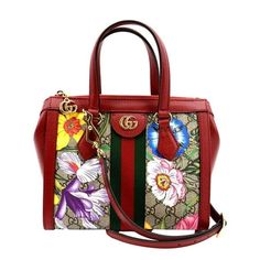 Item Details: Designer: GUCCI Retail: N/A Model: Ophidia GG Flora Style: Tote Bag Material: GG Supreme canvas with Flora print Color: Red/Multicolor Code: 547551 Made: Italy Measurements: 9.5"W x 8"H x 4"D Accessories: Dust Bag, and Shoulder strap. Condition Detail: Excellent - The Item is in excellent condition with minimal signs of use. Outside: Clean condition. Inside: Light dirt, light signs of use. Edges: Light rubbing, light signs of use. Leather: Light dirt marks, signs of use. Hardware: Red Gucci Bag, Gucci Bucket Bag, Flora Print, Gucci Ophidia, Gucci Horsebit, Small Tote Bag, Small Tote, Leather Chain, Print Tote