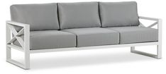 a white couch with grey cushions on it's back and arms, against a white background