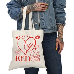 A 100% cotton tote bag is the champion of durability, sustainability, and style. You can print your stunning designs on both sides of this bag in beautiful quality that'll last for years to come. .: Material: 6 oz/yd², 100% natural cotton canvas fabric .: One size: 15" x 16" (38.1 cm x 40.6 cm) .: Convenient self-fabric handles .: Double-sided print Taylor Swift Bag, Tote Bag Painting Ideas Taylor Swift, Taylor Swift Tote Bag Painting, Harry Styles Tote Bag, Taylor Swift Totes, Red Taylor, Cotton Tote Bags, Natural Cotton, Cotton Canvas