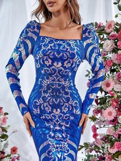 Product Code: FSWD1061 Embellishment: Sequin Fabric: 100% Polyester Back Style: Zipper Up Fully Lined: Yes Built-in Bra: No Available Color: Blue Stretch: Moderate Fits true to size Imported Model Information: Height: 5' 2" Bust: 32'' Waist: 26“ Hips: 37” wearing US size Small Fitted Embellished Mermaid Evening Dress, Blue Long Sleeve Dress For Prom Season, Blue Long Sleeve Mermaid Dress For Weddings, Blue Long Sleeve Mermaid Wedding Dress, Blue Sequined Mermaid Dress For Prom, Glamorous Blue Sequin Mermaid Dress, Blue Mermaid Dress For Wedding, Fitted Embellished Mermaid Dresses, Blue Evening Dress With Back Zipper