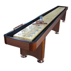 an image of a shuffle table with glasses on it's top and one side