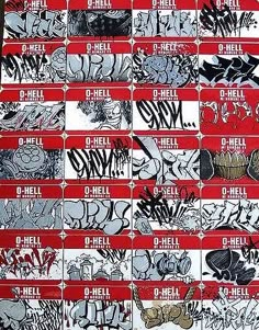 a bunch of stickers that are on the side of a wall