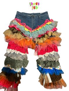 a pair of jean shorts with multicolored ruffles