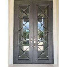 two double doors with glass panels on each side