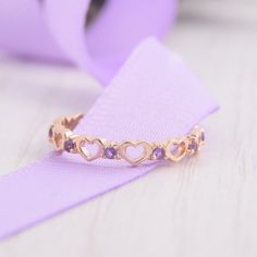 Dainty 14k rose gold heart purple amethyst womens wedding band, Unique small minimalist amethyst wedding ring, Amethyst jewelry,Gift for her WE OFFER UNLIMITED PERIOD INSTALLMENTS PLAN This is a beautiful, stunning, feminine ring that works well for all occasions, styles, and ages. You will love it! Ring information: Stone: Amethyst Approximate size: 1.5mm (8 stones) Metal type: Gold Metal stamp: 14k Gold Installment Payments We offer installment payments for an unlimited period for absolutely a Wedding Ring Amethyst, Amethyst Wedding Ring, Amethyst Wedding Rings, Cute Promise Rings, Heart Purple, Wedding Band Unique, Purple Rings, Purple Jewelry