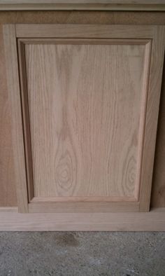 an unfinished cabinet door is shown in this image