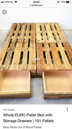 two wooden pallet beds with storage drawers on each side and one is made out of wood pallets